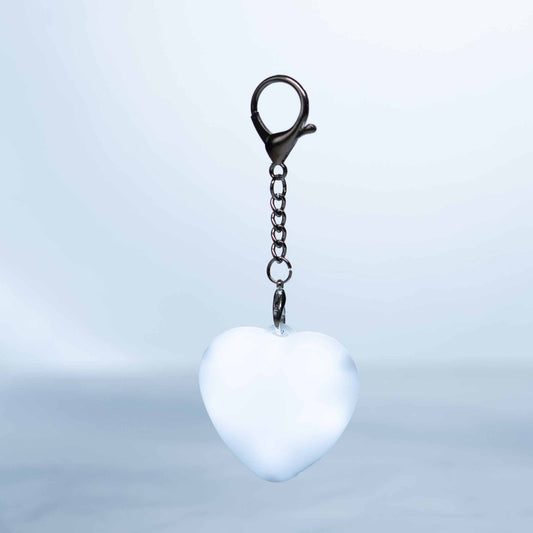 LumiHeart™ Motion Glow heart-shaped keychain light with motion-activated soft white LED glow and metal hook