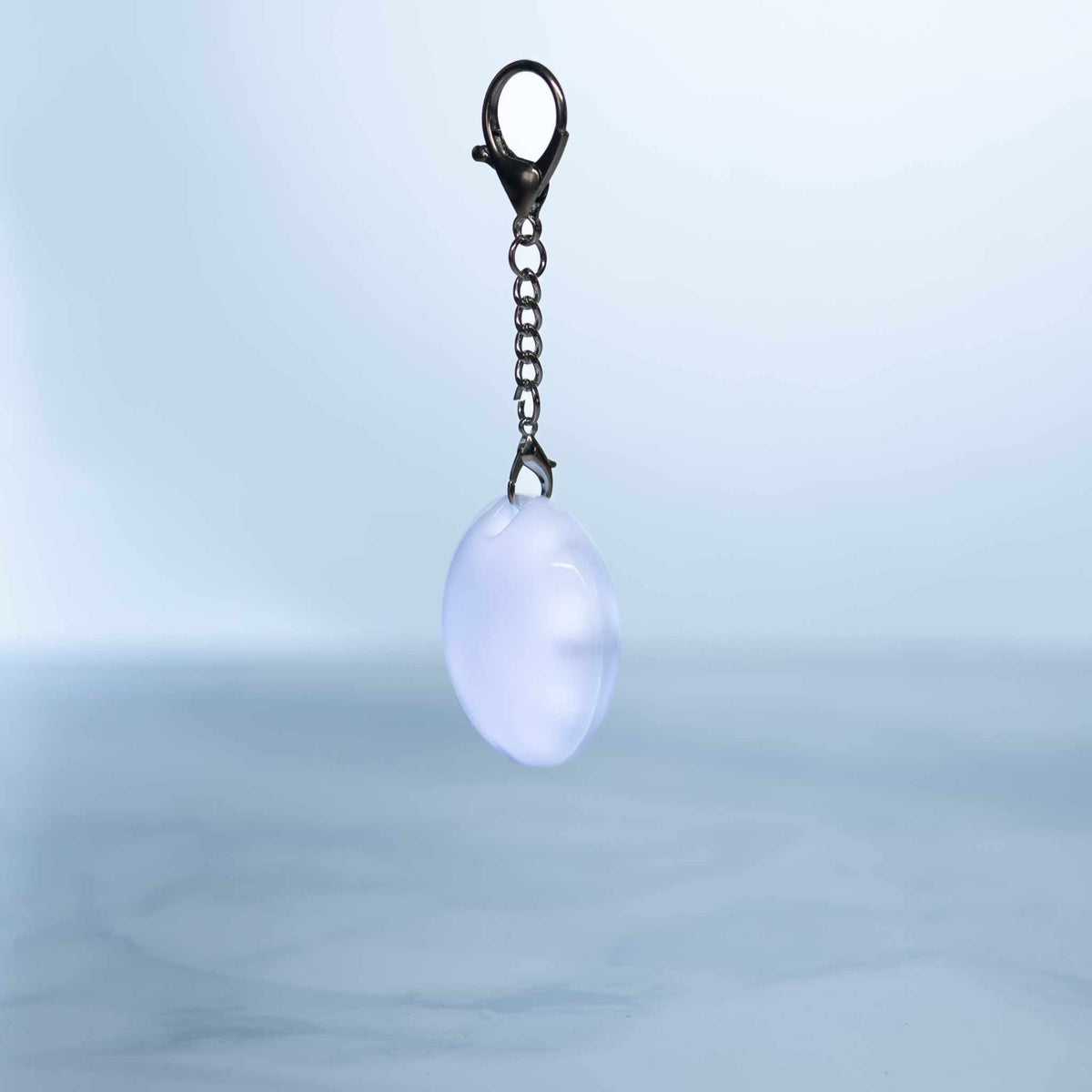 LumiHeart™ Motion Glow keychain light with soft white LED and motion-activated glow on metal hook